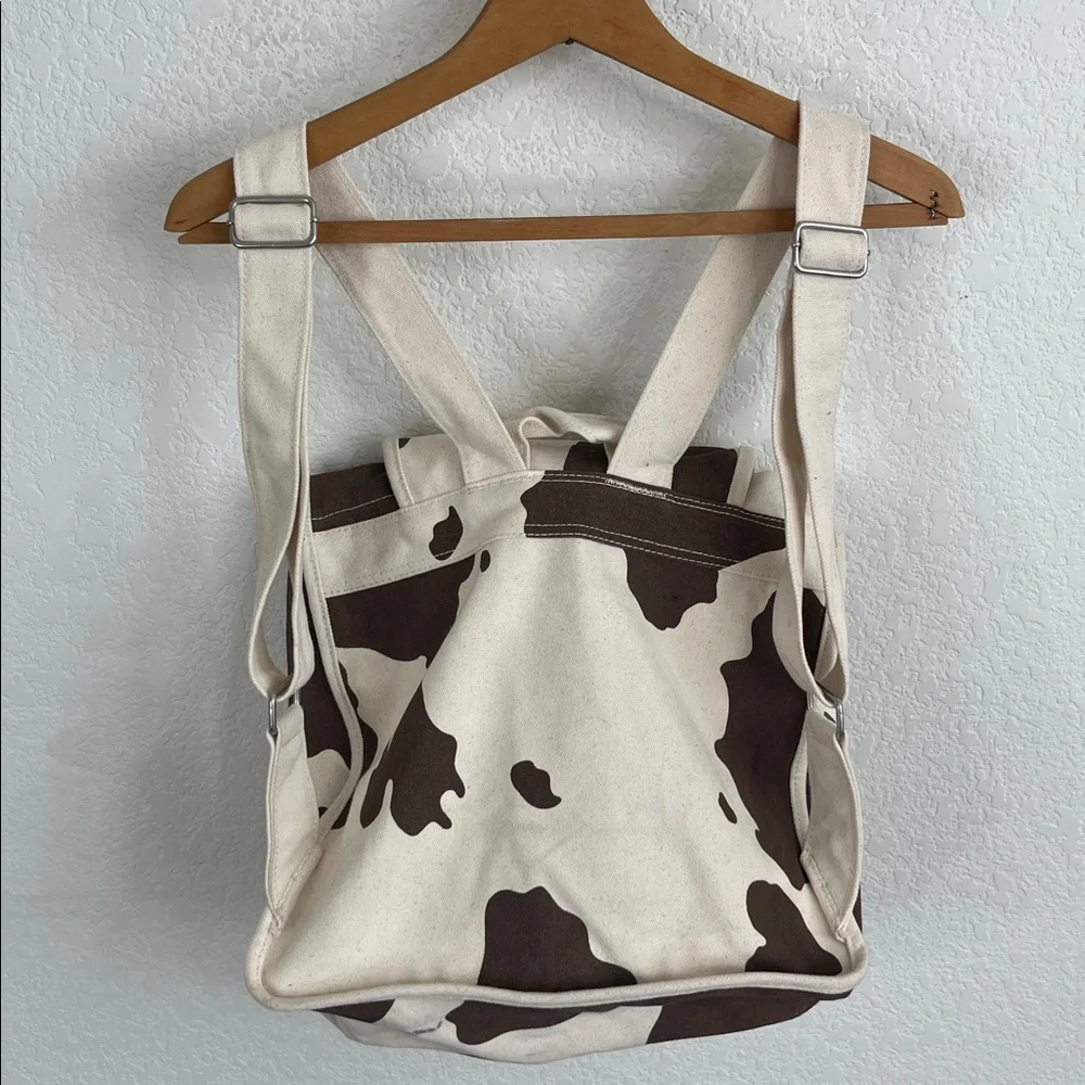 BAGGU Canvas Cow Print Backpack in Cream and Brown